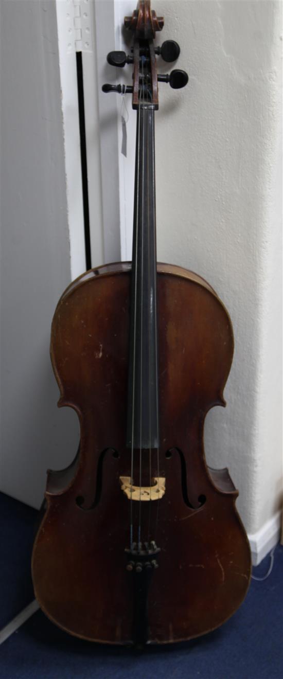 An early 20th century cello, probably French, body 29.5in., length overall 49in.